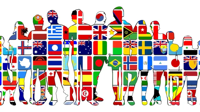 Flaggen in Menschen (Foto: Bild von OpenClipart-Vectors auf Pixabay)